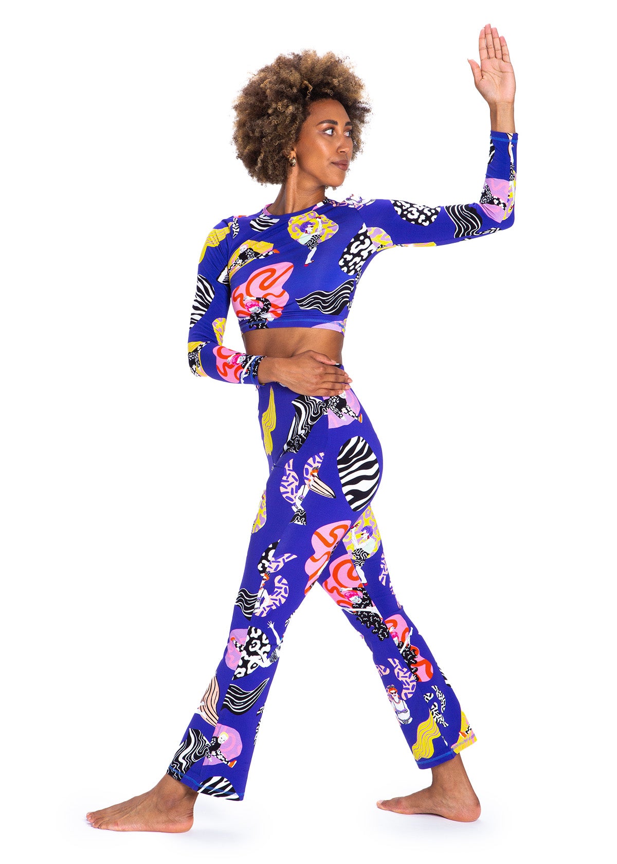 Woman wearing a colorful athletic outfit on a white background