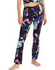Person wearing colorful abstract-patterned leggings on a white background